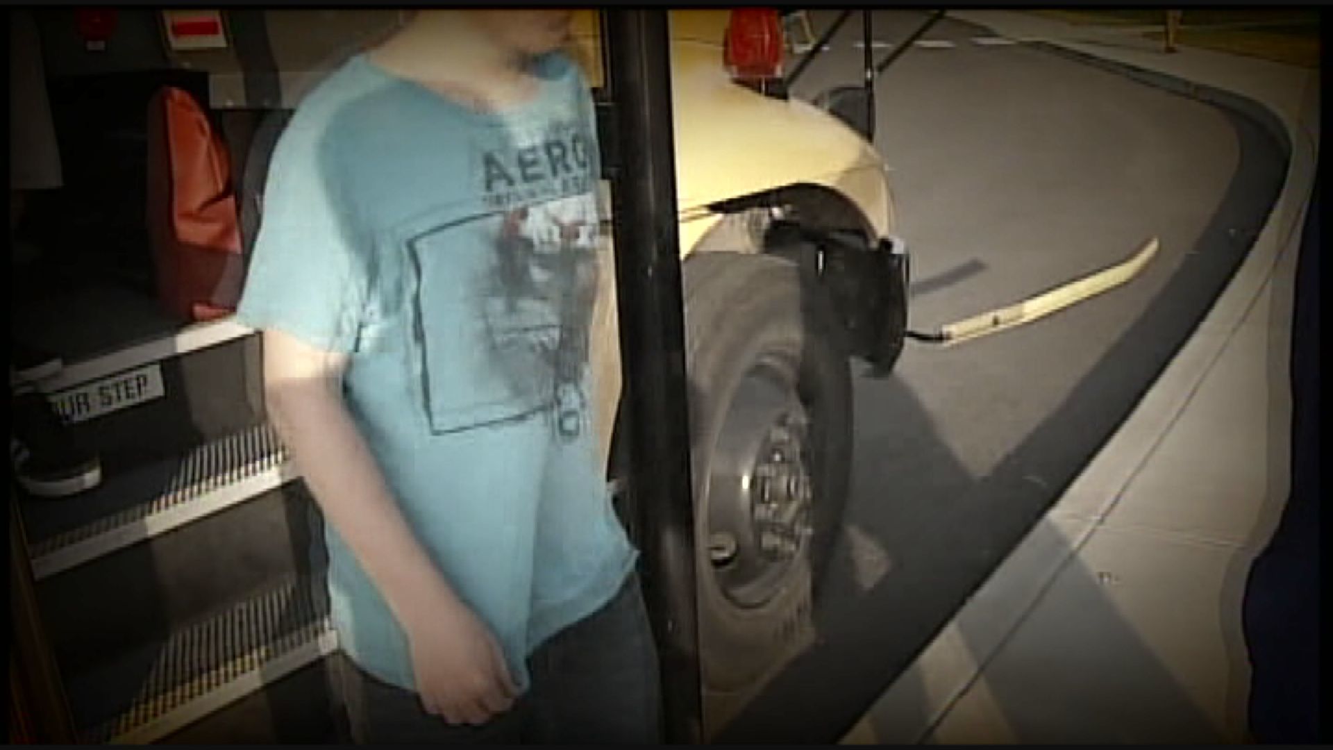 student gets off bus